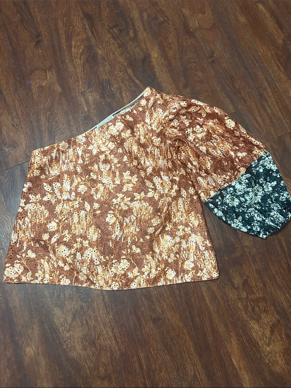 Anthropologie One-Shoulder Brown Floral Top with Contrasting Black Sleeve